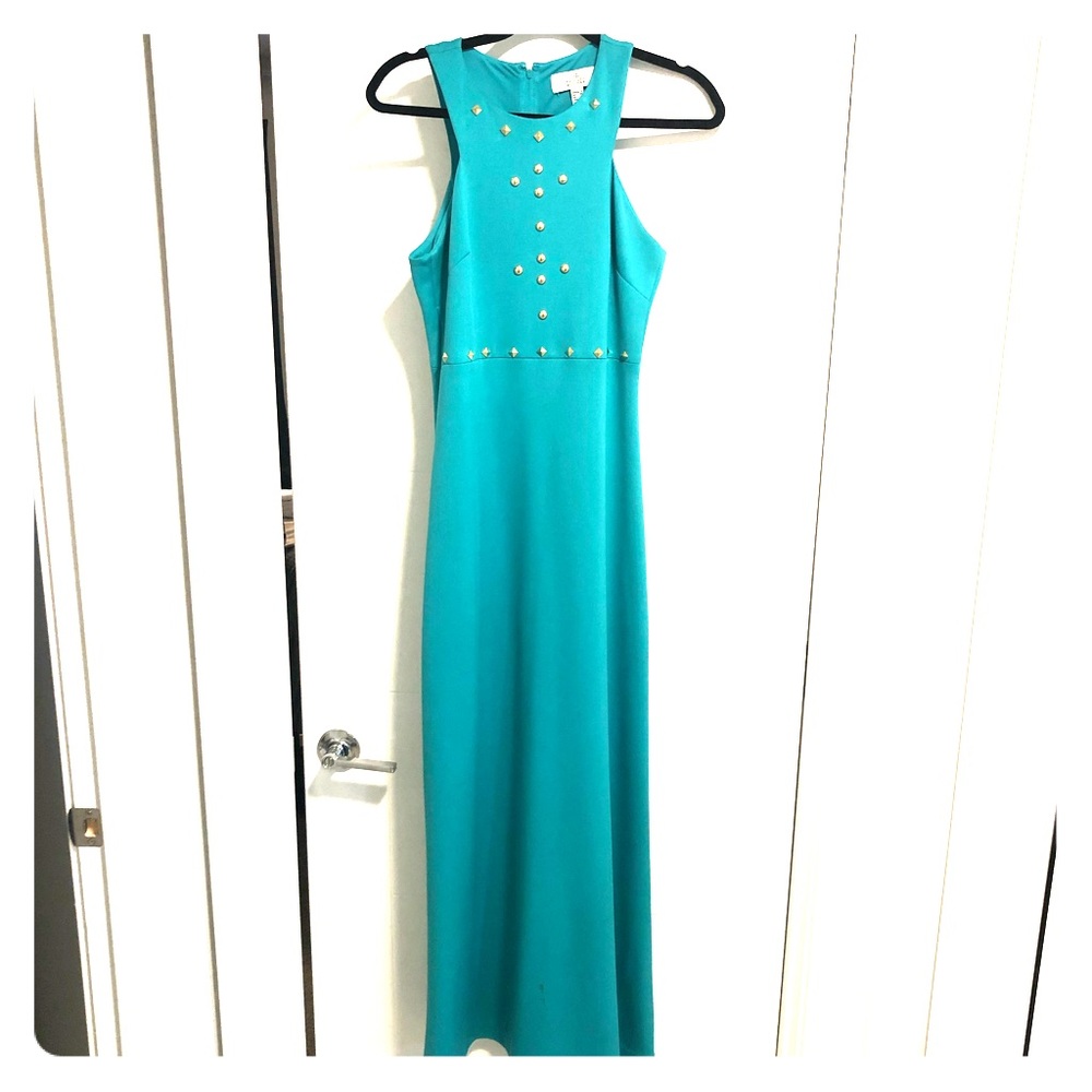 Long turquoise halter dress by Badgley Mischka.